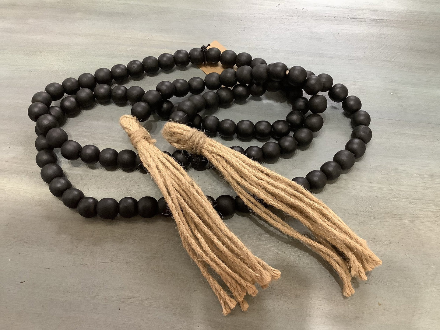 BLACK WOOD BEADS WITH JUTE TASSLE