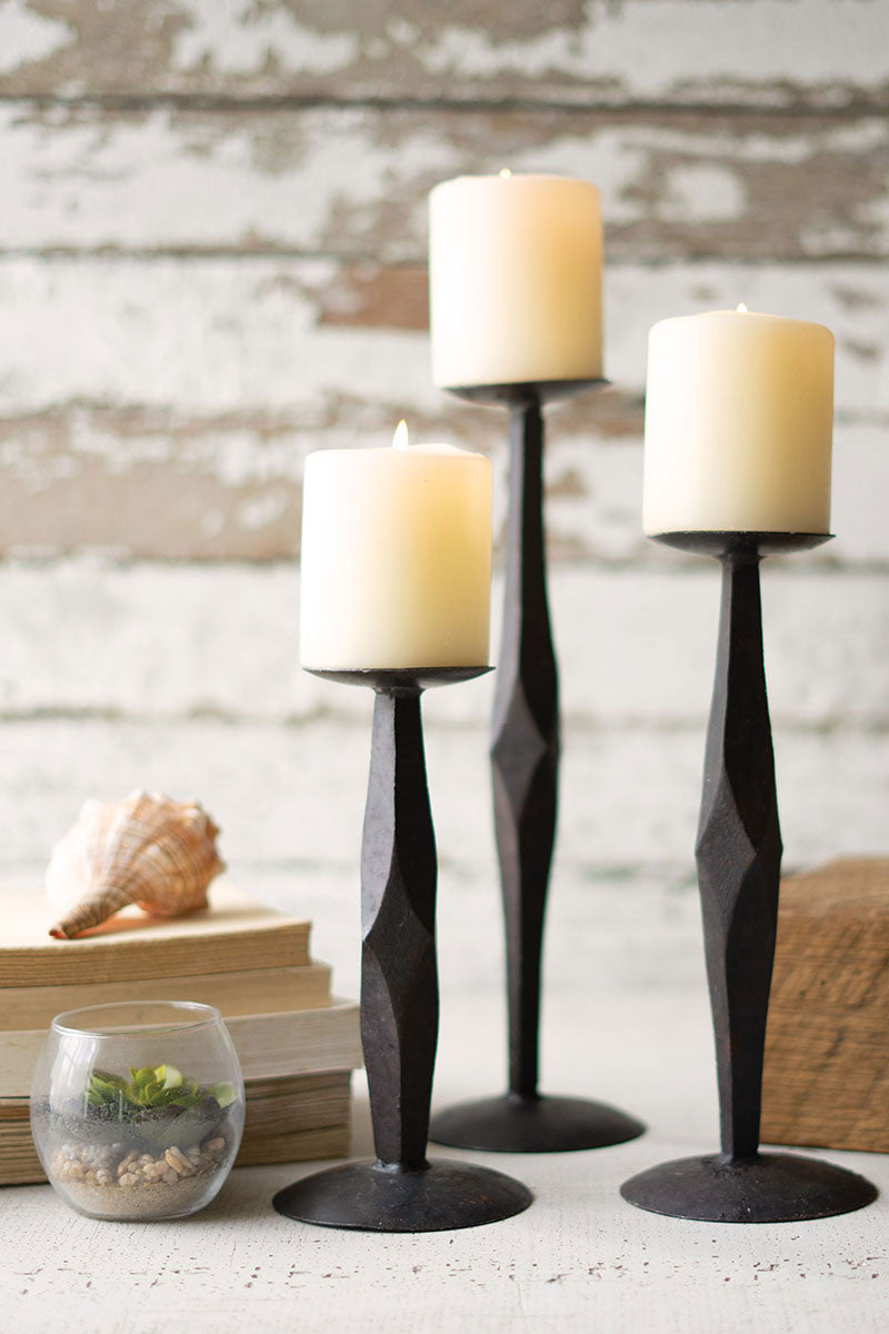 set of 3 iron candle sticks with candles